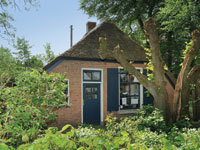 Foto witgepleisterd landarbeidershuis, Huinerenkweg 8